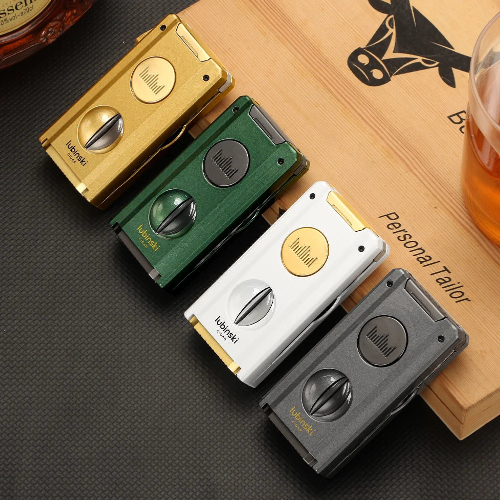 Four different colorued cigar lighters on a wooden surface.