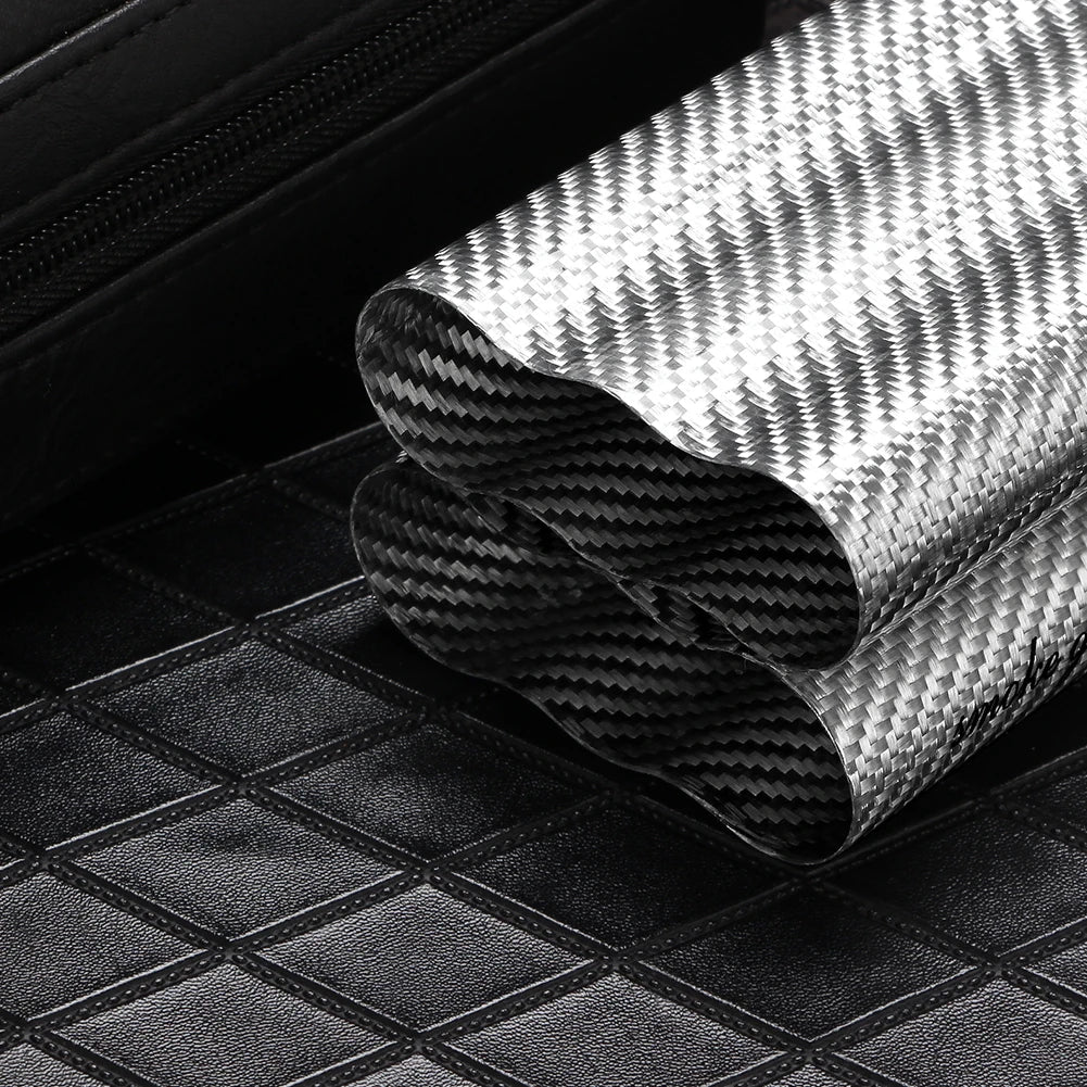 Roll of carbon fiber paper on a textured surface
