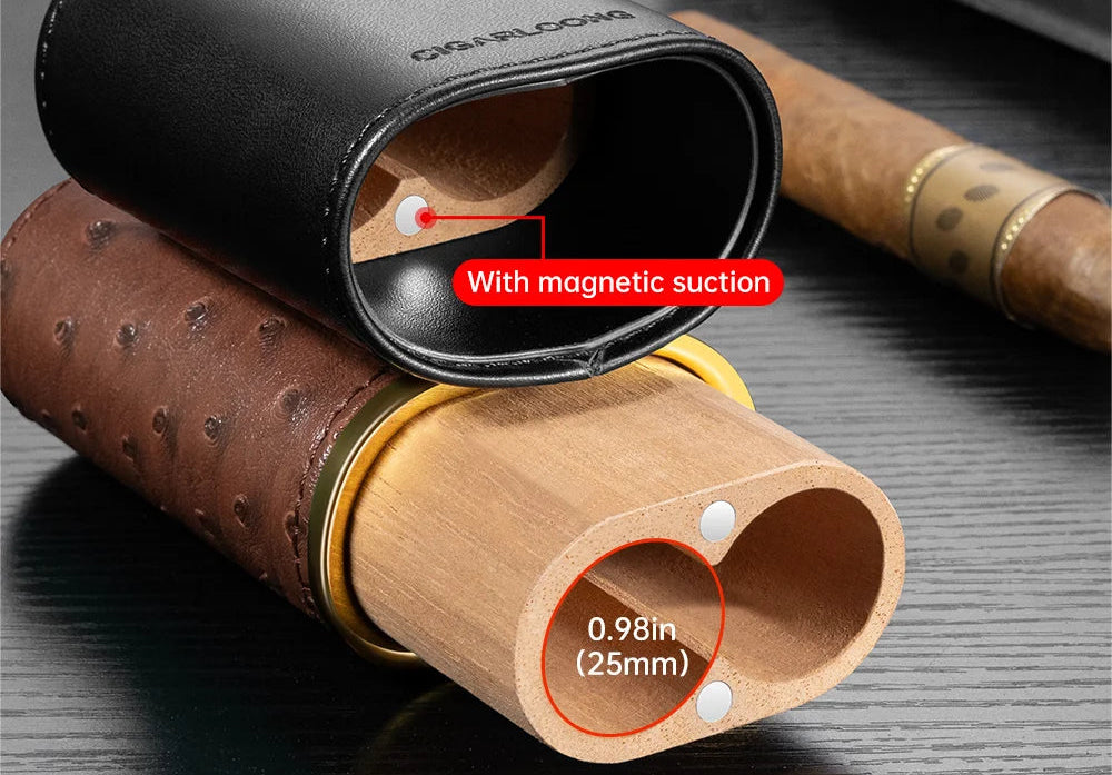 Cigar with cedar wood liner and black casing on a dark surface, highlighting magnetic suction feature.
