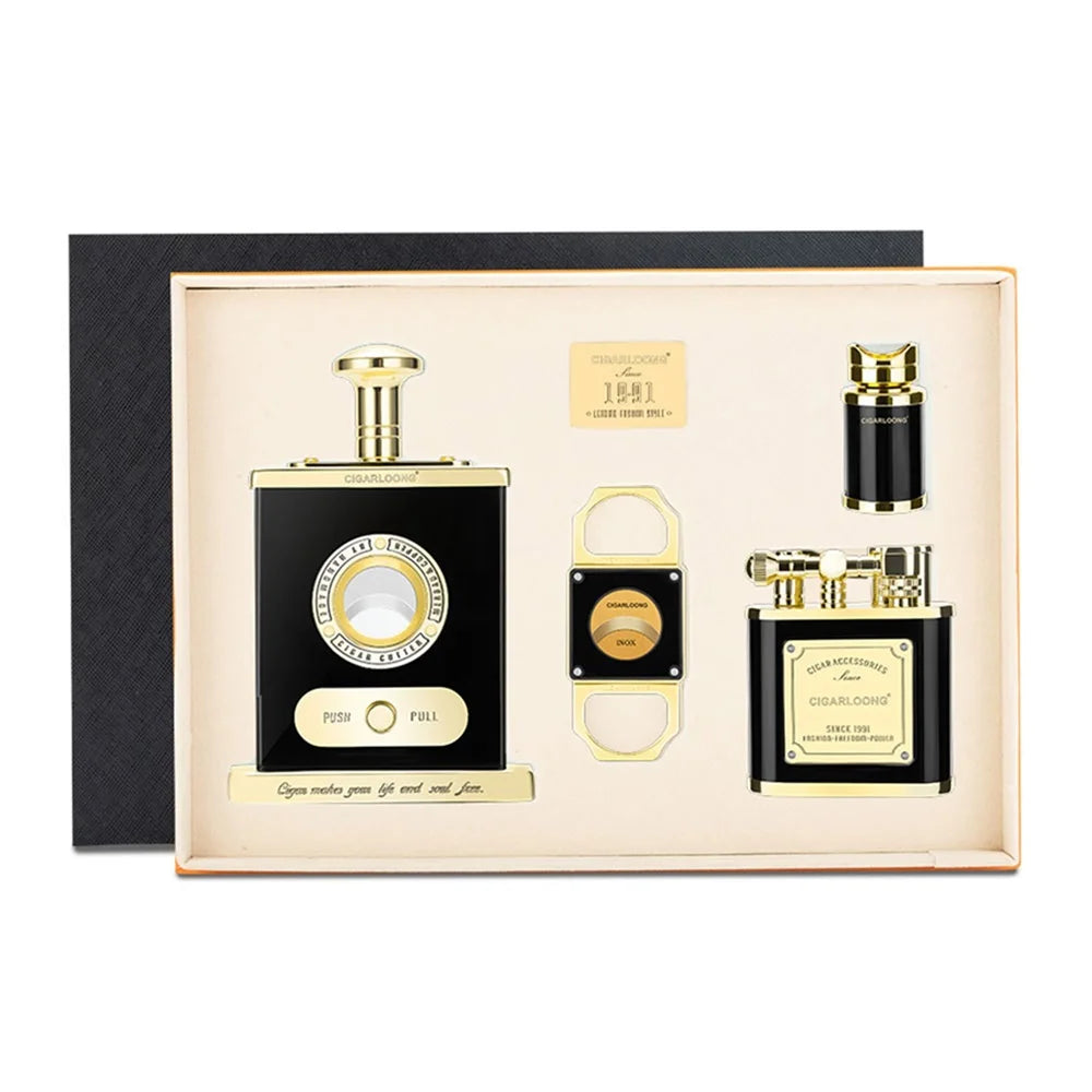 Black and gold cigar accessory set on a white background