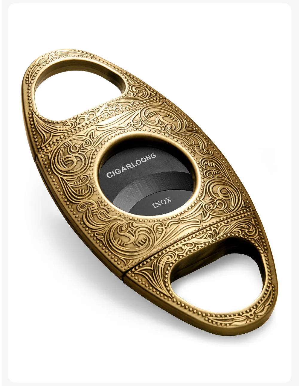 Gold ornate cigar cutter  with black blade on a white background