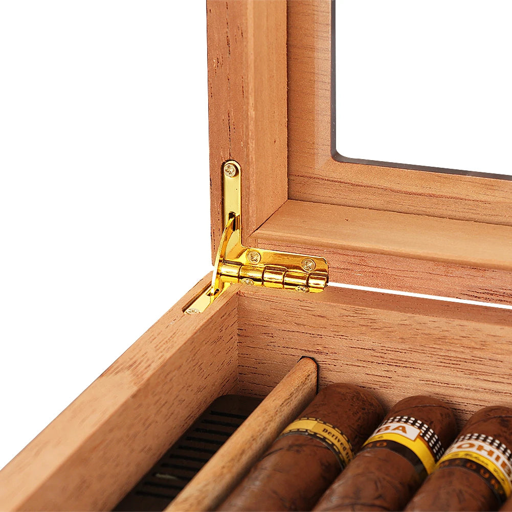 Wooden humidor with gold hinged lid containing cigars.